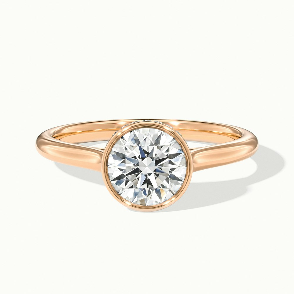 Angel 1.5 Carat Round Bezel Set Moissanite Diamond Ring in 10k Rose Gold