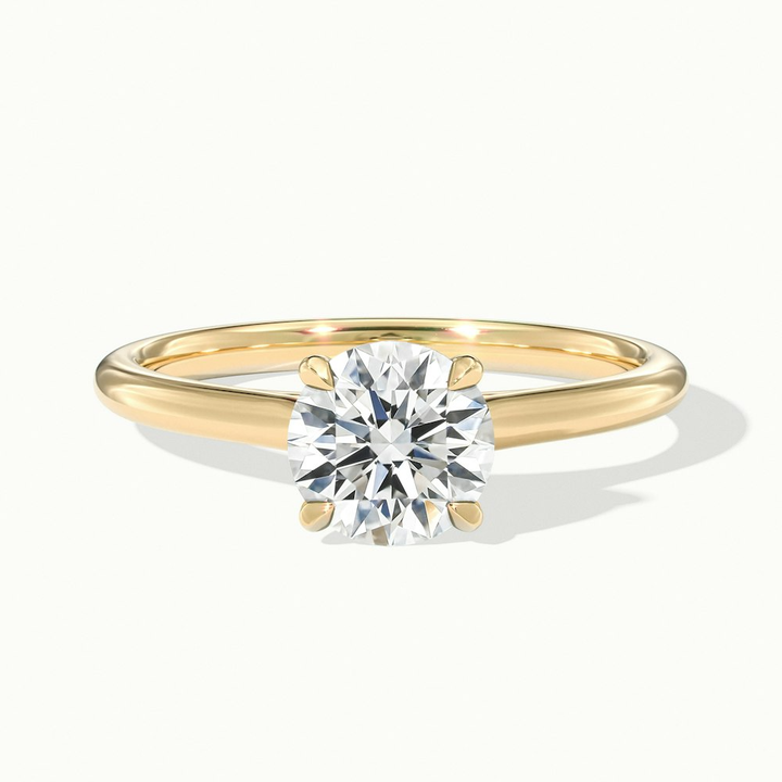 Iara 1.5 Carat Round Solitaire Moissanite Engagement Ring in 10k Yellow Gold