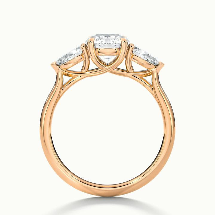 Amaya 1 Carat Round 3 Stone Moissanite Diamond Ring With Pear Side Stone in 10k Rose Gold